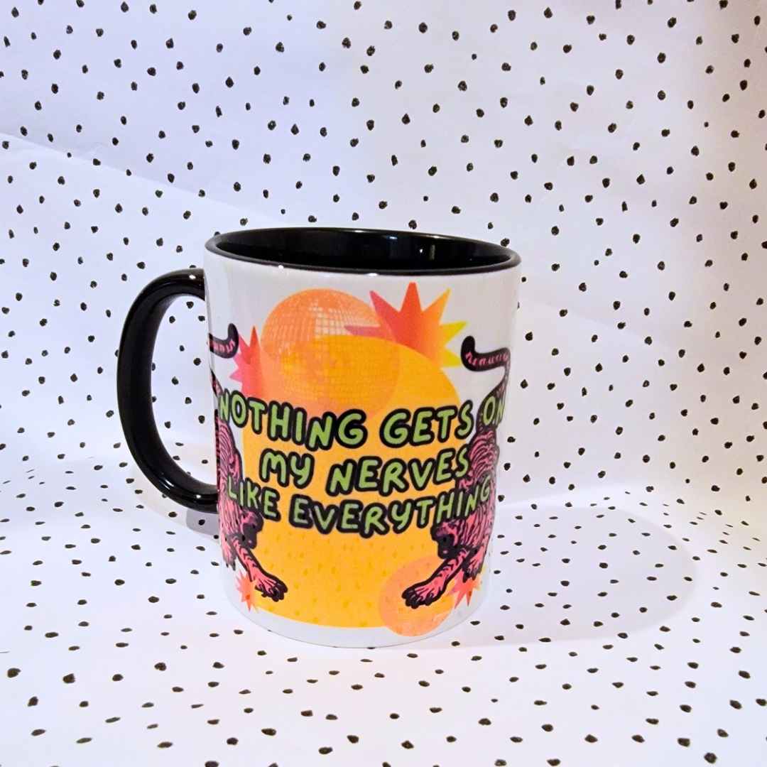NOTHING GETS ON MY NERVES MUG
