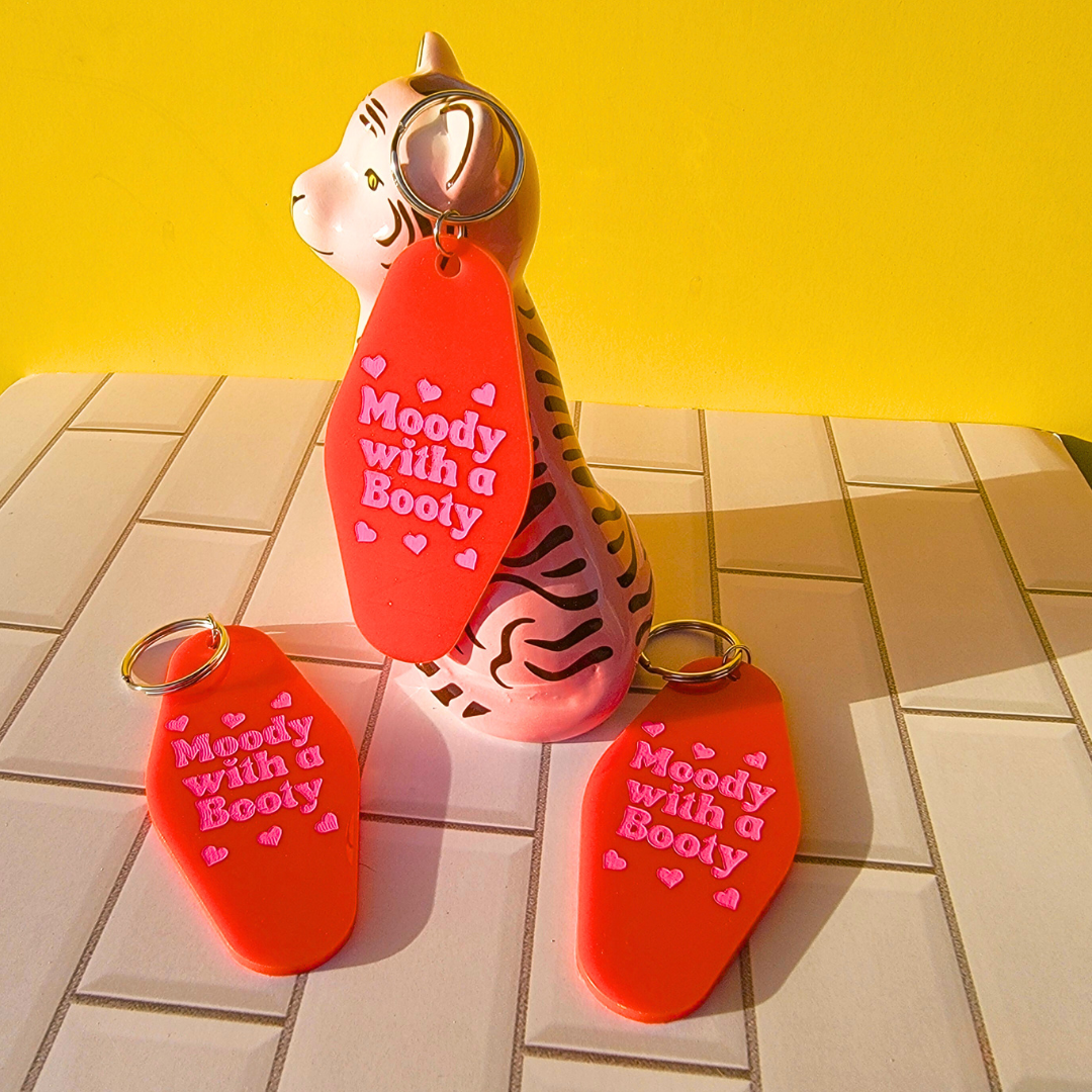 MOODY WITH A BOOTY KEYCHAIN